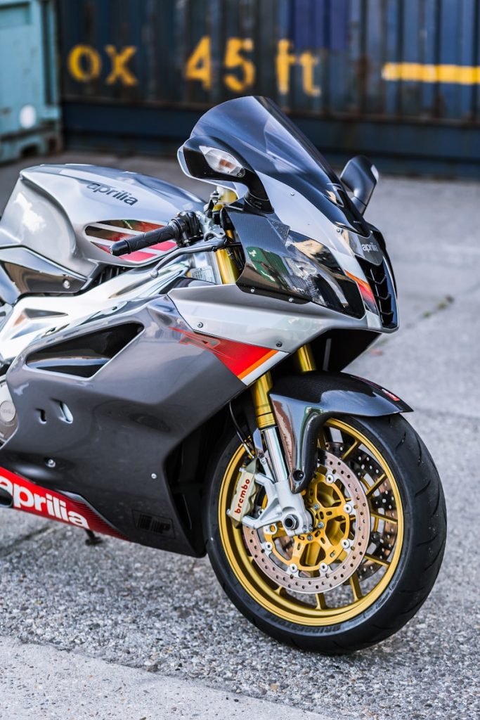 black and gray sportbike, aprilia 