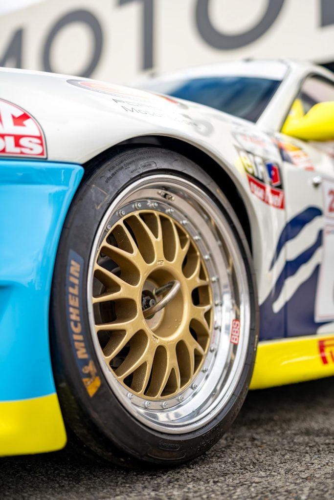 A close up of a racing car on a race track Porsche 911